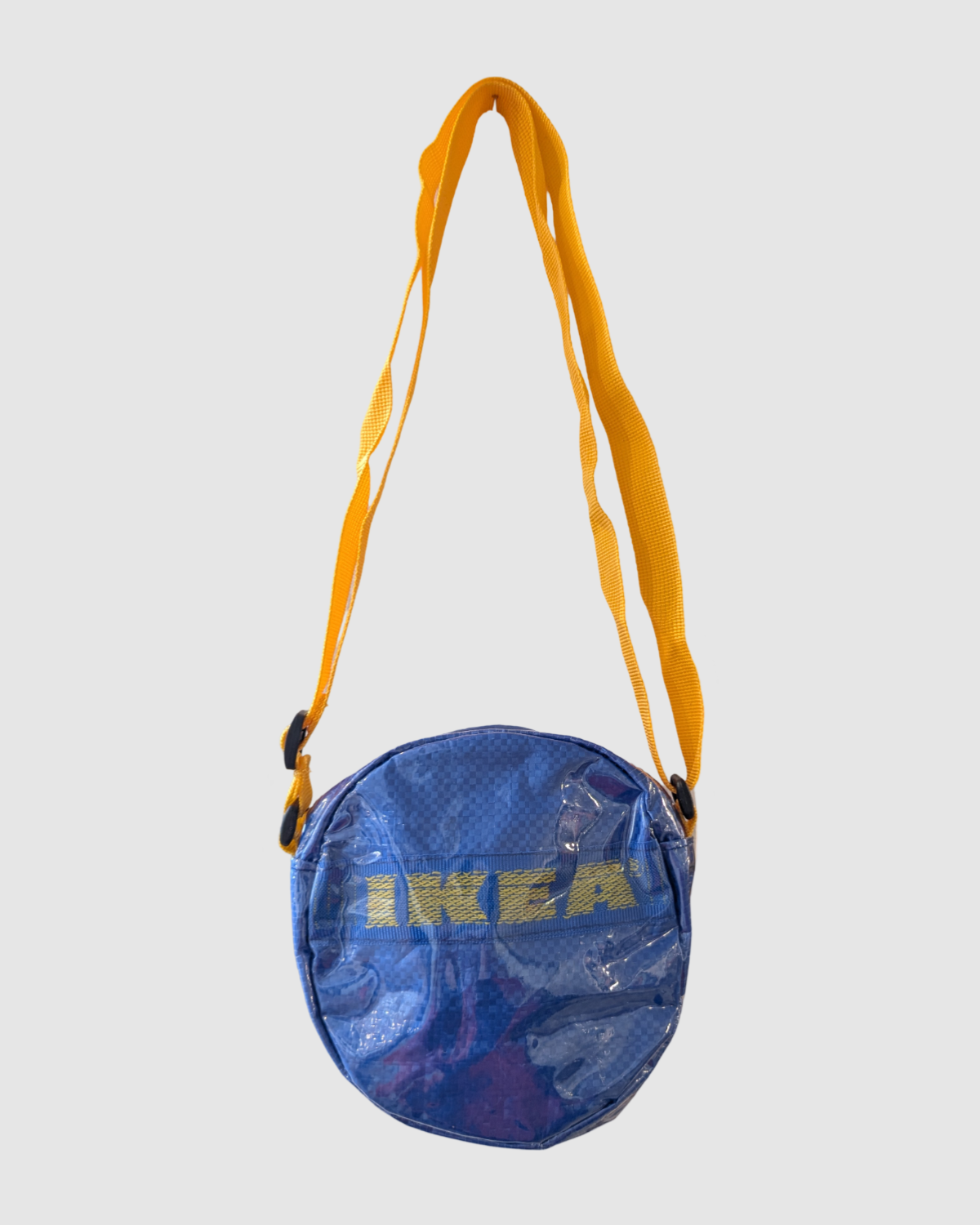 Lille rund taske af upcycled emballage