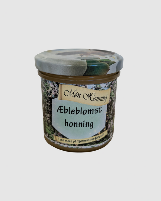 Æbleblomst-honning fra Møn i glasbeholder – 100% naturlig, koldslynget og bæredygtig dansk honning